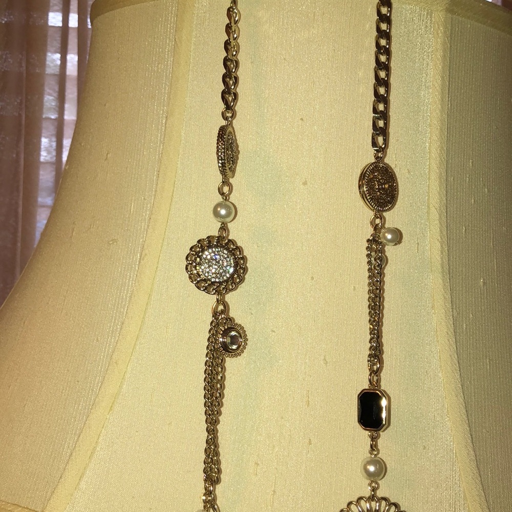 Long pearl and gold necklace